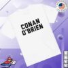 kenny podswag store merch conan o%27brien needs a friend name plate shirt whitepsd w